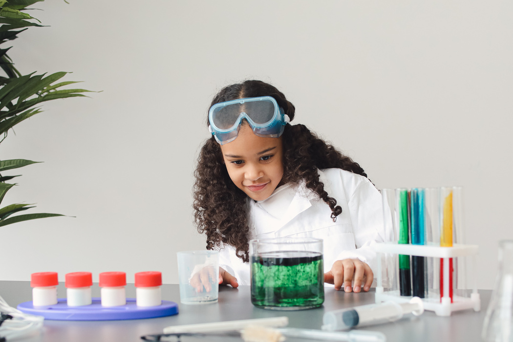 Girl Doing Science Experiment with Dyes